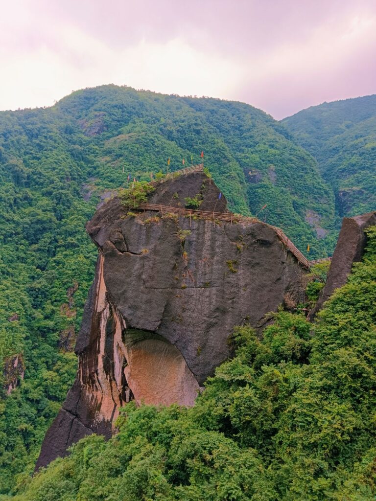 Majestic King Rock rising above the cliffs on the Mawryngkhang Trail.