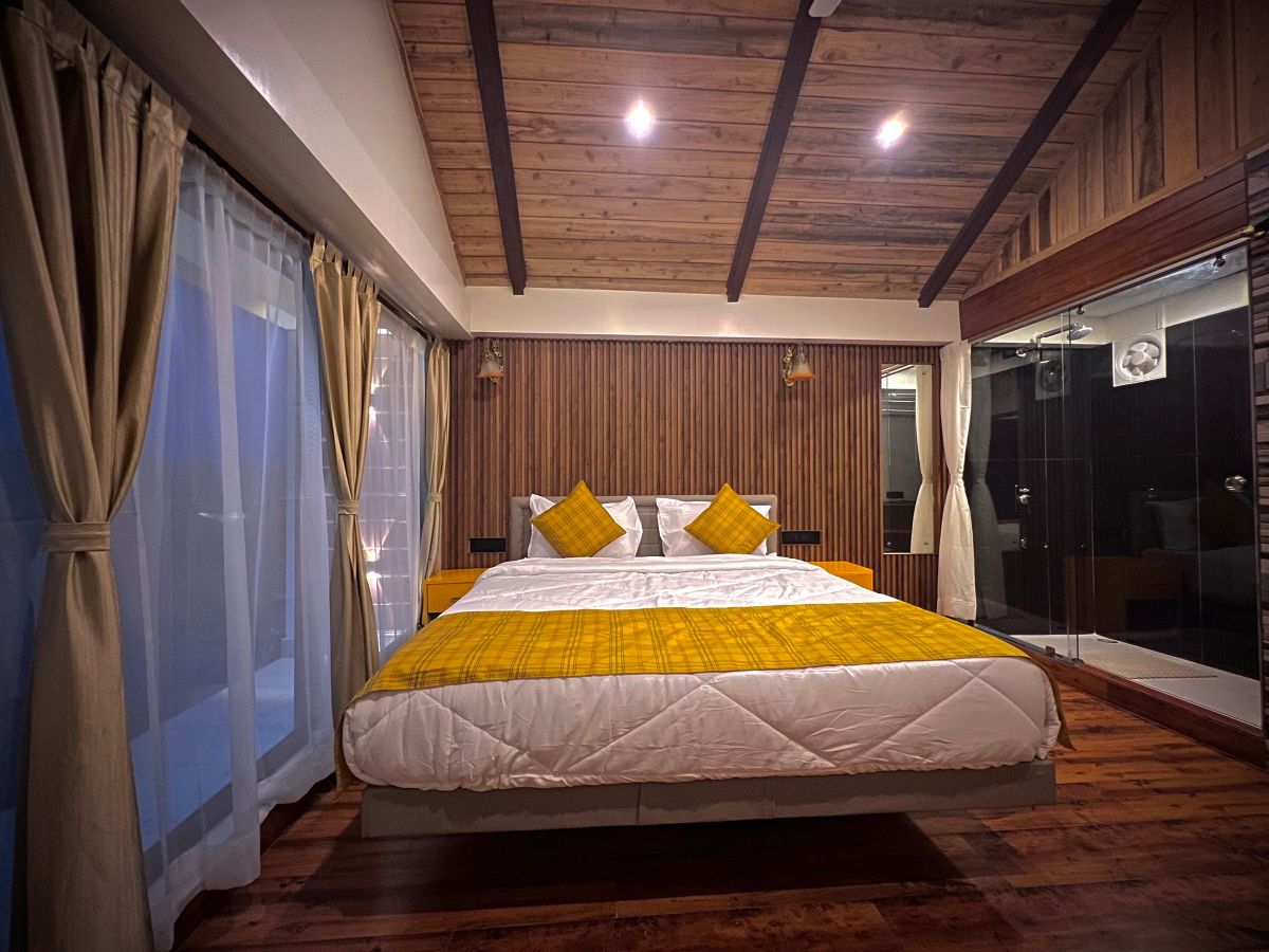 Elegant executive room with plush bedding, workspace, and modern amenities.