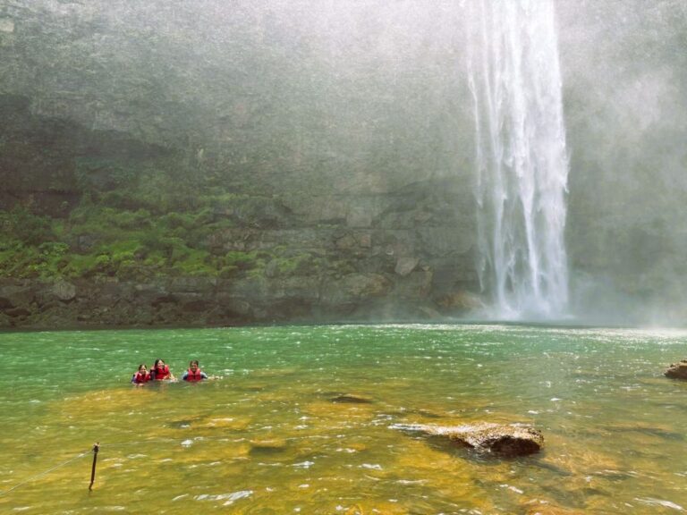 Phe Phe Waterfall cascading into a clear pool during a Meghalaya trek